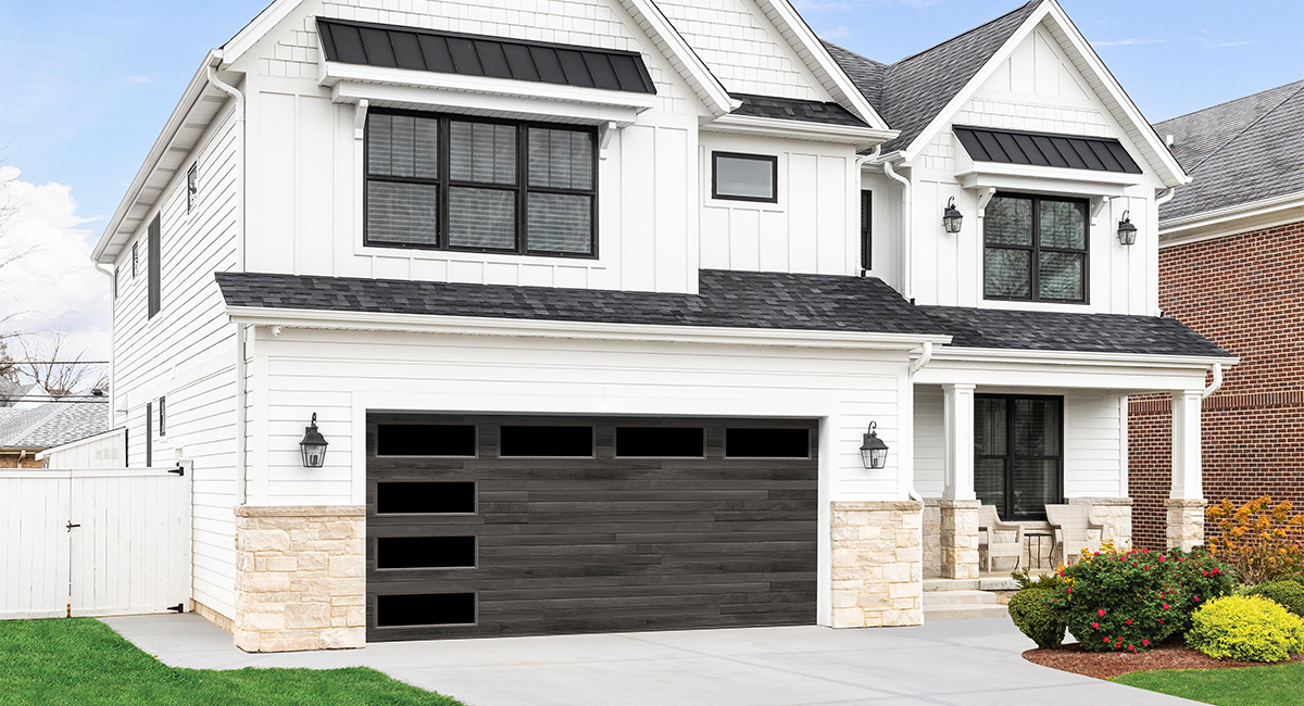 Contemporary Panel Steel Garage Door with a Carbon Oak Plank Wood Grain Finish and Clear Vertical and Horizontal Windows
