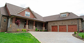 Ranch Style Home with Steel Garage Doors